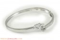 Click here to View - 18Kt Gold Bangle with Star Signity 