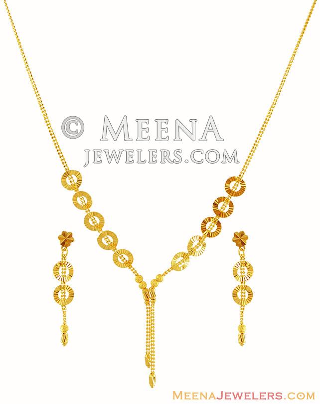 22K Light Necklace Set StLs16329 22K Gold Necklace and Earring set. The Necklace is designed