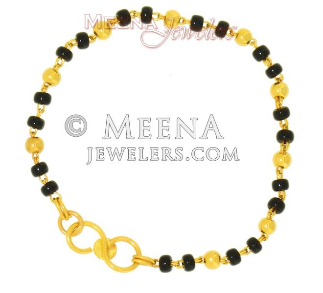 Baby Bracelet with Black beads BjBb2127 22Kt gold baby bracelet