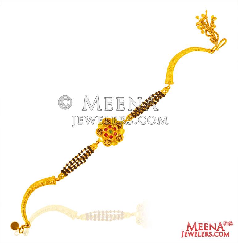 22K Ladies Bracelet BrLa27264 US 1,286 22kt gold ladies bracelet with flower in the